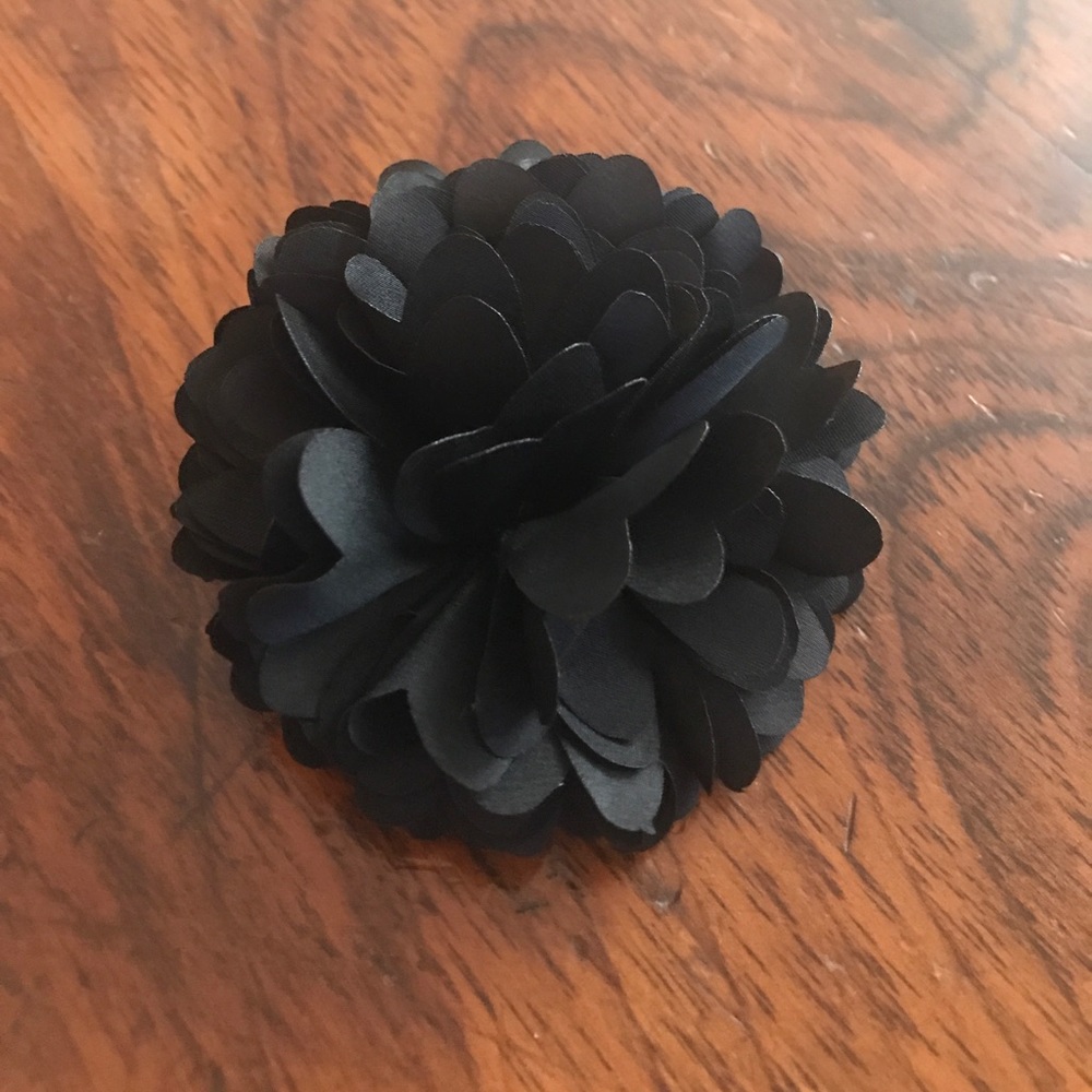 New black flower pin by Hat Attack